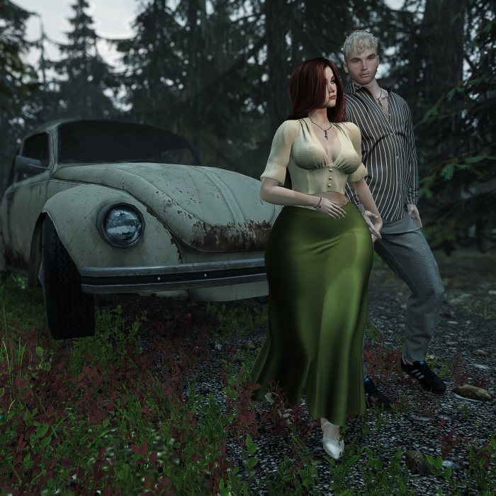 Couple posing in front of a rusty old car in a misty forest in Cerulean, Second Life