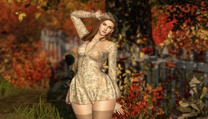 Anika Whiskers smiling warmly under colorful autumn trees