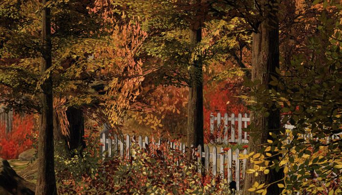 Dense autumn foliage in warm red and orange hues above the picket fence