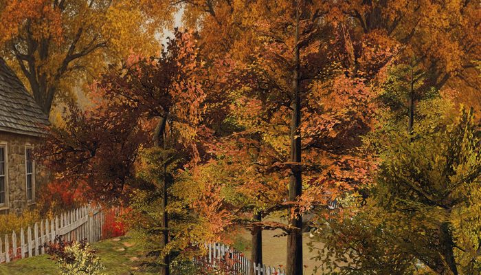 Overgrown path with white picket fence surrounded by colorful fall trees
