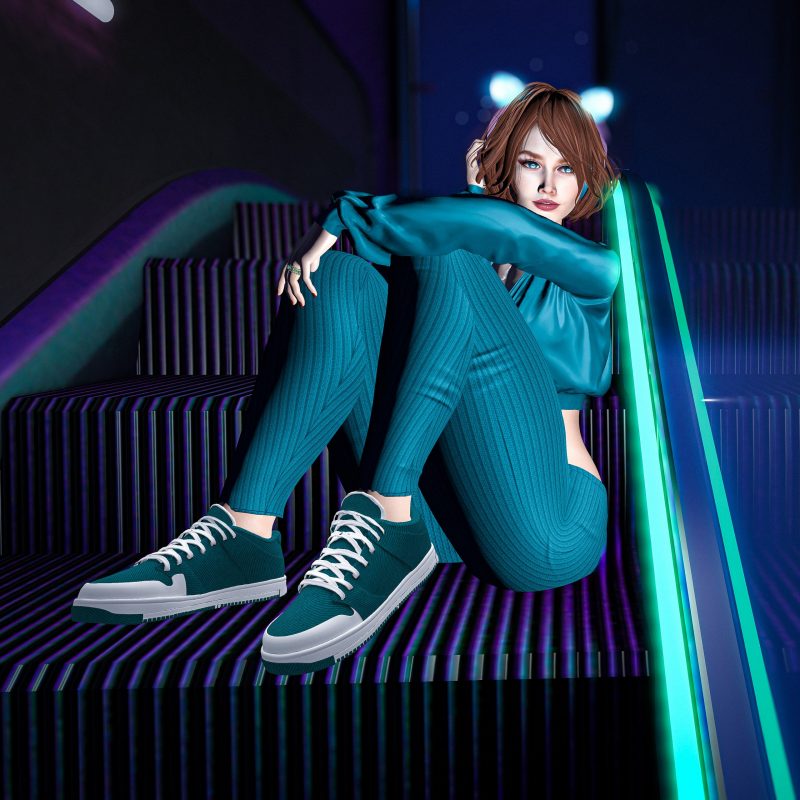 Delicatt streetwear look – cropped jacket on escalator. sitting on neon-lit escalator in teal streetwear outfit with cropped jacket.
